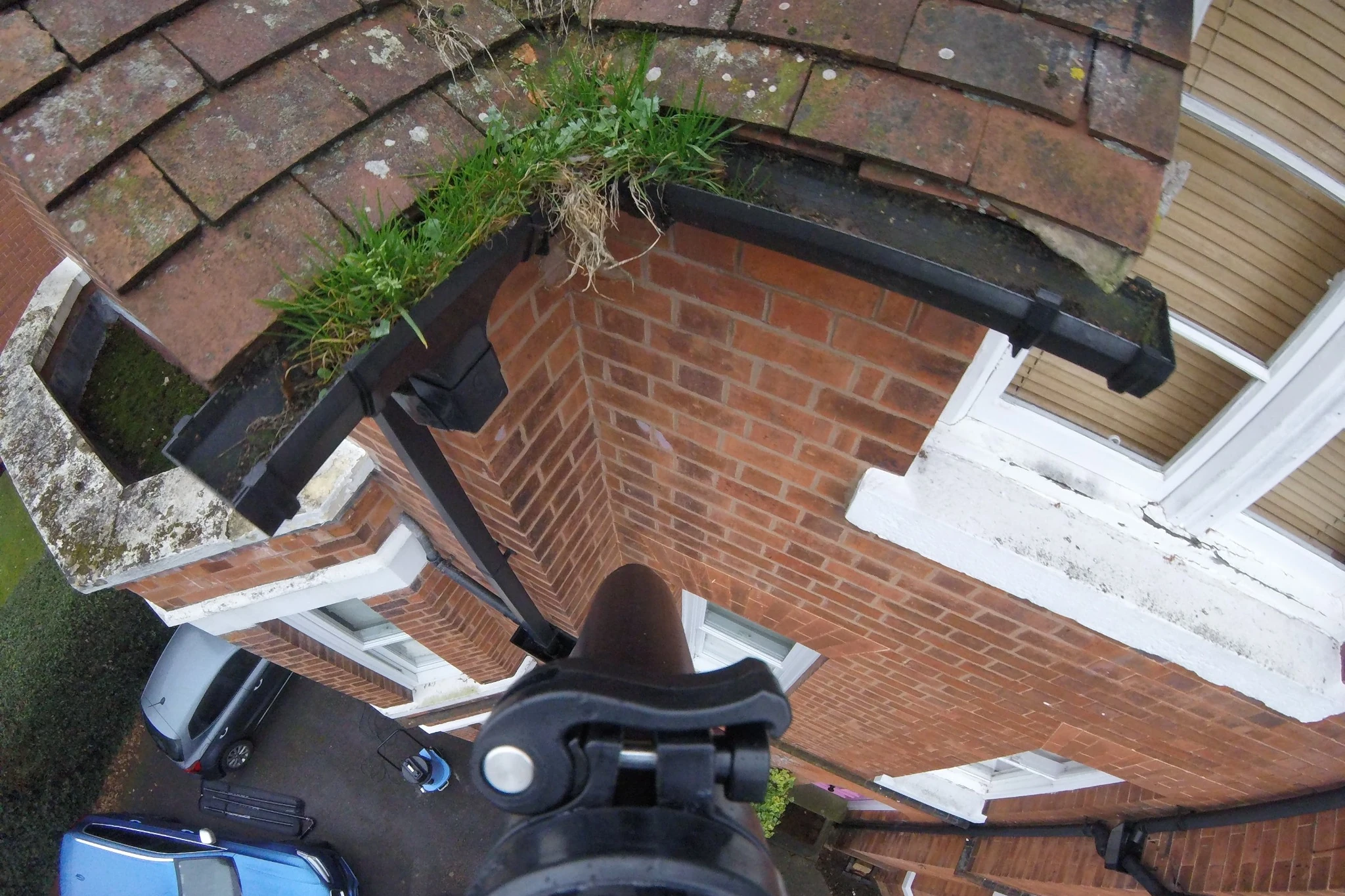Commercial gutter before professional cleaning by Exact Clean
